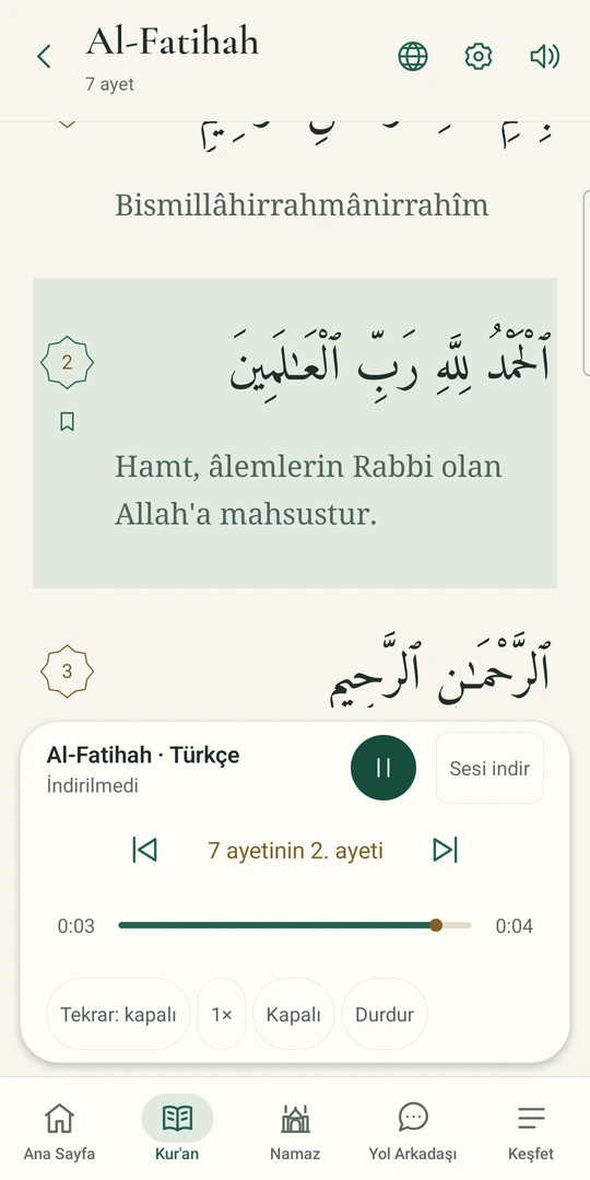 The actual Quran audio player showing playback progress, repeat options and next/previous controls.